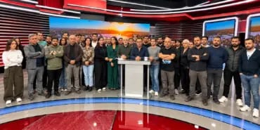 Somber Group in a News Studio